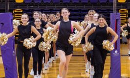 Thirty-six Belles stretch across the Wylie High School gym during practice. The 14th line is the largest in program history.