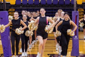 Members of the Wylie Belles' 14th Line move onto the floor during practice. With a record of 36 members, the team must learn to match not only the choreography but the energy and attention of the people around them.
