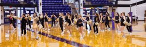 Thirty-six Belles stretch across the Wylie High School gym during practice. The 14th Line is the largest in program history.