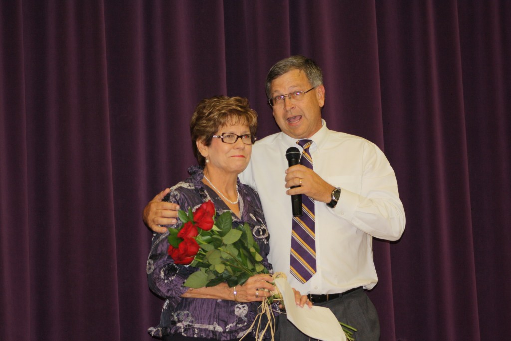Wylie Superintendent Joey Light presents Wylie Bulldogs Education Foundation President Becky Rentz with flowers for her hard work on behalf of the district.