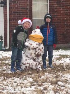 Harvey (1st) and Jackson (2nd) with their snowman.